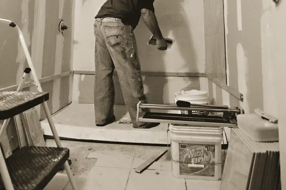 Bathroom mid-renovation with walls being prepared